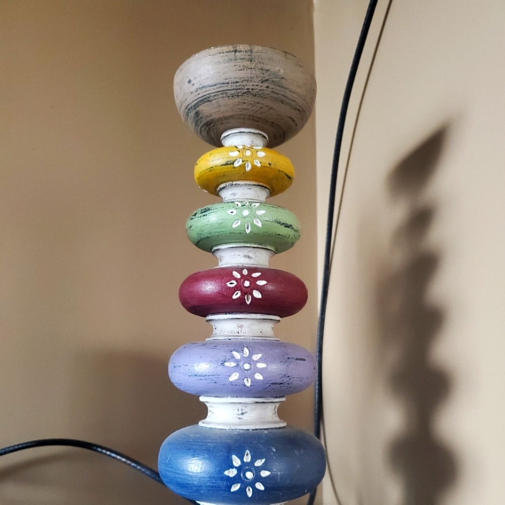 Multi colored rustic candle holder
